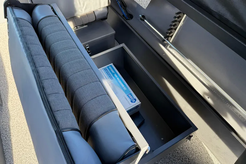 Slide: The Image of Interior storage compartment of 2026 Alumaweld Stryker 202 boat with seating and equipment. - 23