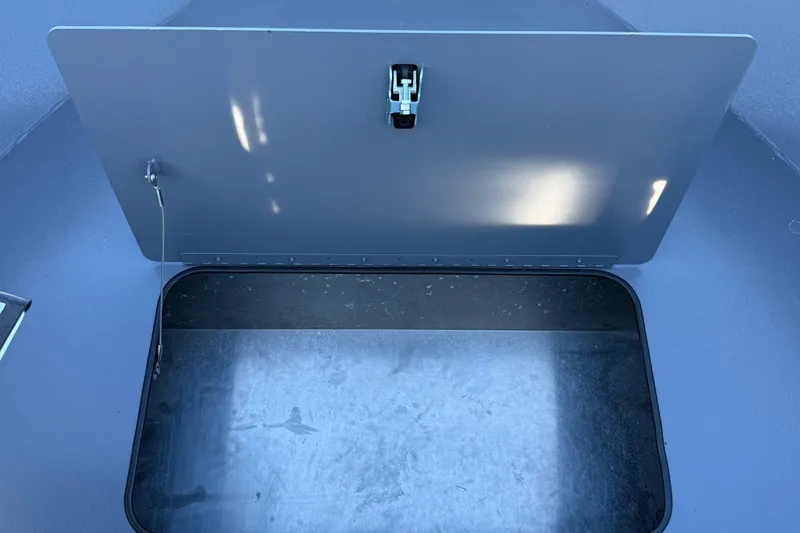 Slide: The Image of Open storage compartment on 2026 Alumaweld Stryker 202 boat. - 29