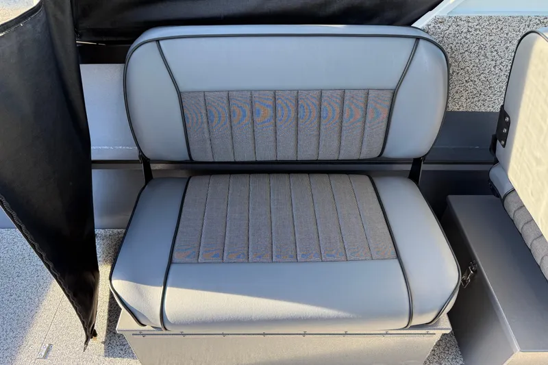 Slide: The Image of 2026 Alumaweld Stryker 202 boat seat with gray and patterned upholstery. - 32