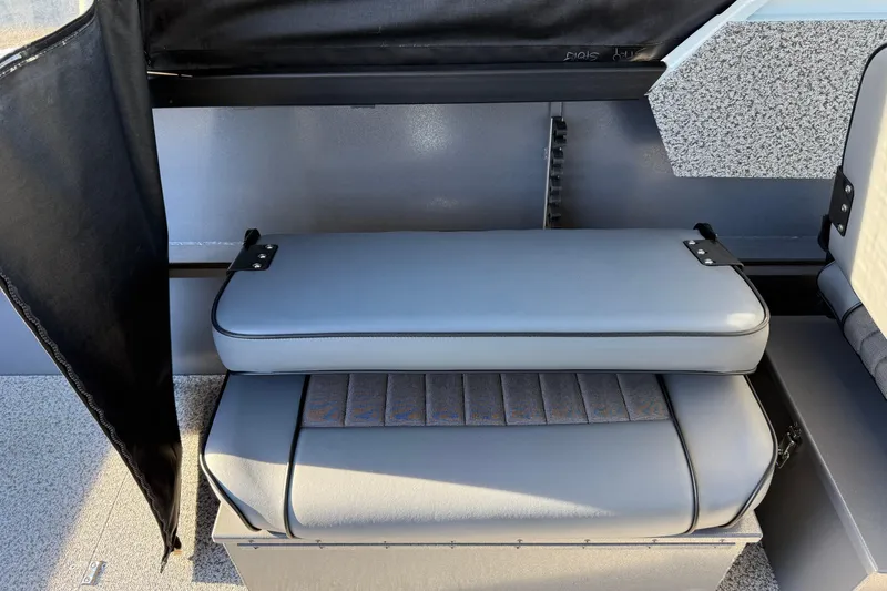 Slide: The Image of 2026 Alumaweld Stryker 202 boat interior seating with gray upholstery. - 33