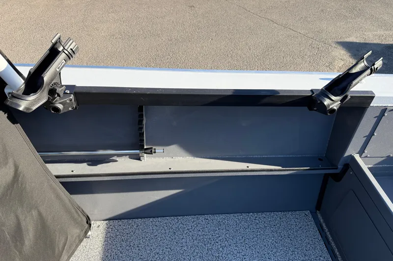 Slide: The Image of 2026 Alumaweld Stryker 202 boat interior with rod holders and textured flooring. - 37