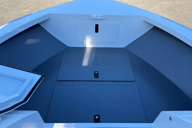 Slide: The Image of Interior view of 2026 Alumaweld Stryker 202 boat, featuring spacious storage compartments. - 38