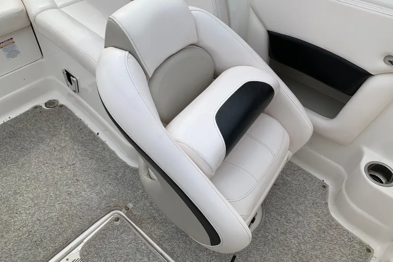 Slide: The Image of White and black seat on 2008 Chaparral Sunesta 224 boat interior. - 20
