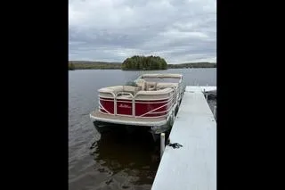 Slide: The Image of 2020 Sun Tracker Party Barge 22 RF XP3 docked on a calm lake. - 4