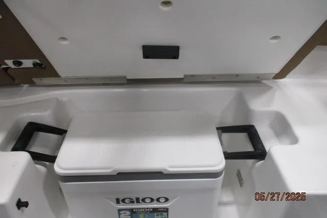 Slide: The Image of Interior of 2025 Tahoe 210 Si boat with Igloo cooler storage compartment. - 11