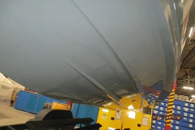 Slide: The Image of Underside view of a 2025 Tahoe 210 Si boat in a storage facility. - 19