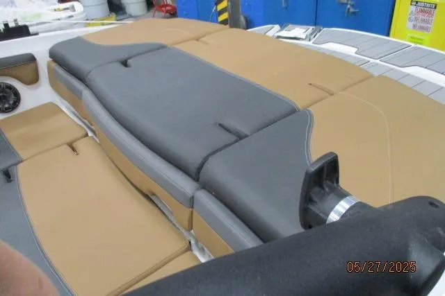 Slide: The Image of 2025 Tahoe 210 Si boat interior with tan and gray seating. - 4