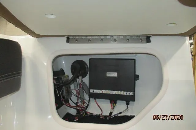 Slide: The Image of Electrical compartment of 2025 Tahoe 210 Si boat, showcasing wiring and components. - 7