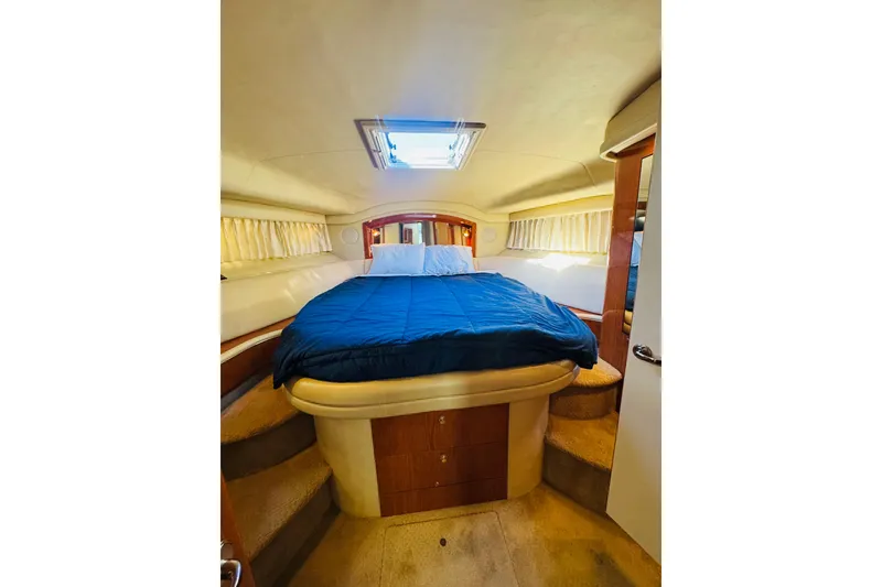 Slide: The Image of Luxurious cabin interior of 2000 Sea Ray 400 Sedan Bridge yacht. - 51