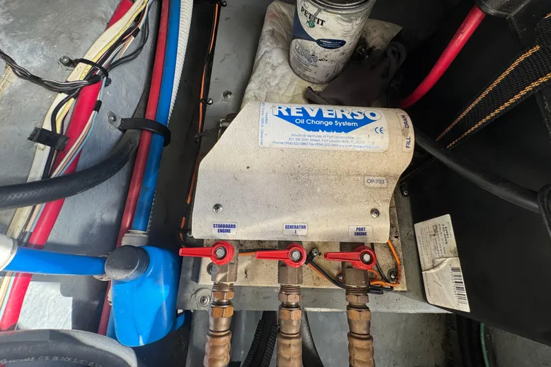 Slide: The Image of Engine room of 2000 Sea Ray 400 Sedan Bridge with Reverso oil change system. - 61