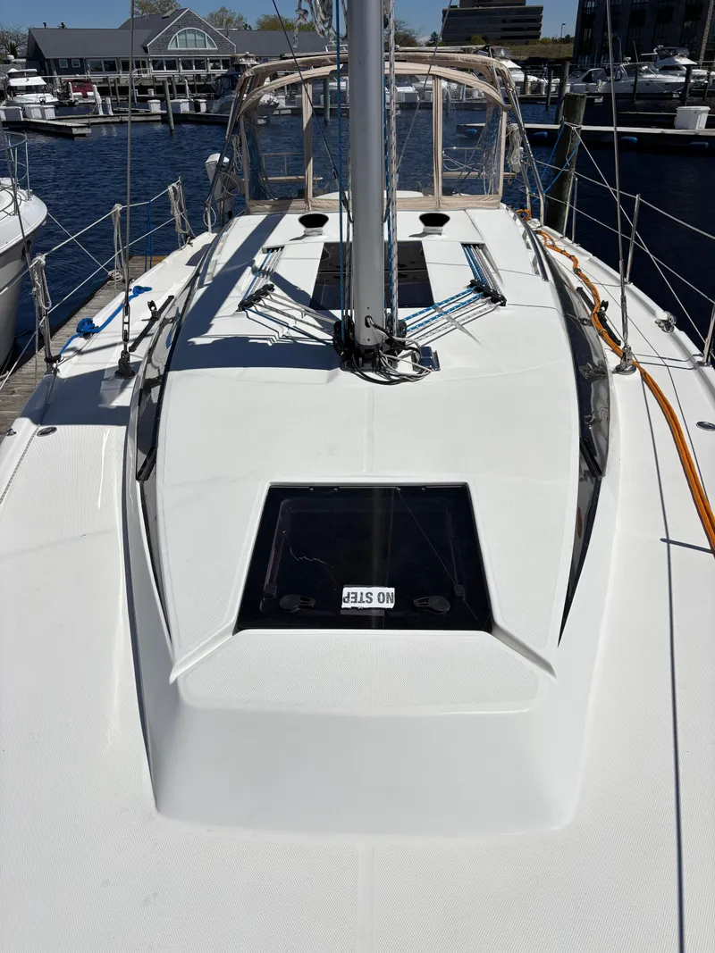 Slide: The Image of 2016 Marlow-Hunter 37 sailboat in harbor, deck view. - 17