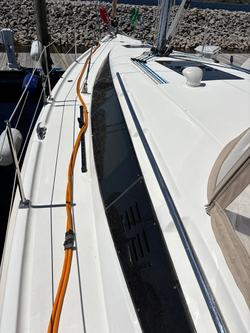 Slide: The Image of 2016 Marlow-Hunter 37 sailboat deck with ropes and equipment. - 21