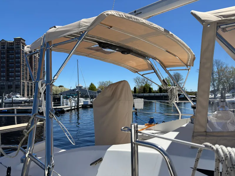 Slide: The Image of 2016 Marlow-Hunter 37 sailboat docked in marina on a sunny day. - 25