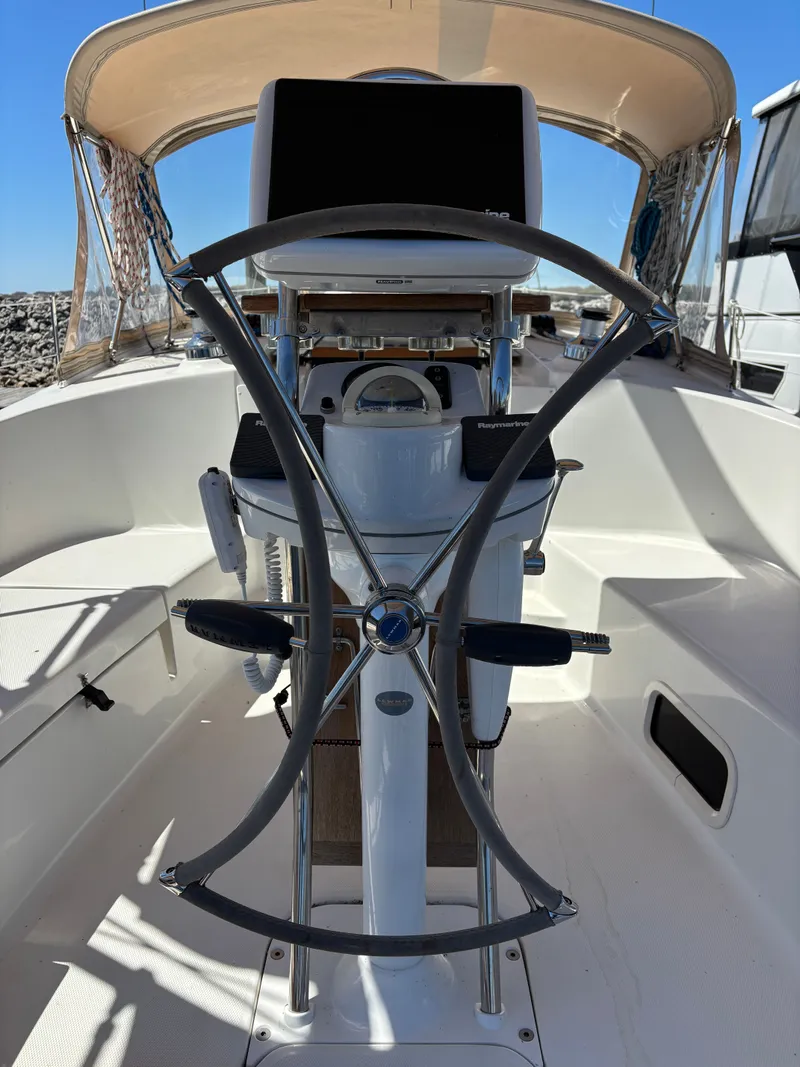 Slide: The Image of Helm of a 2016 Marlow-Hunter 37 yacht under sunny skies. - 26