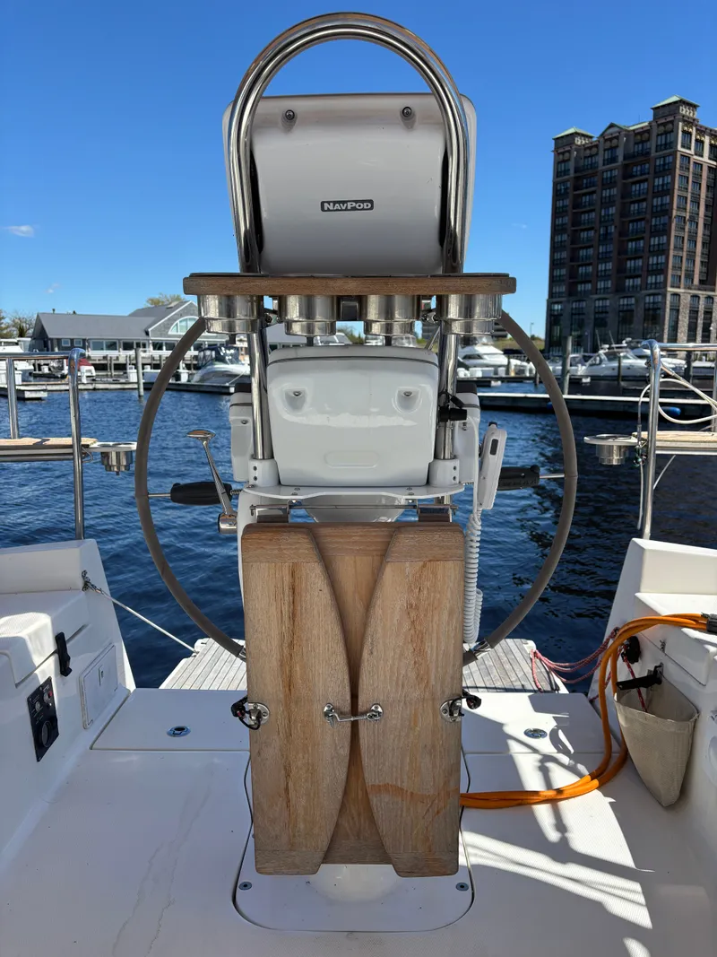 Slide: The Image of Steering wheel of a 2016 Marlow-Hunter 37 yacht in harbor. - 33