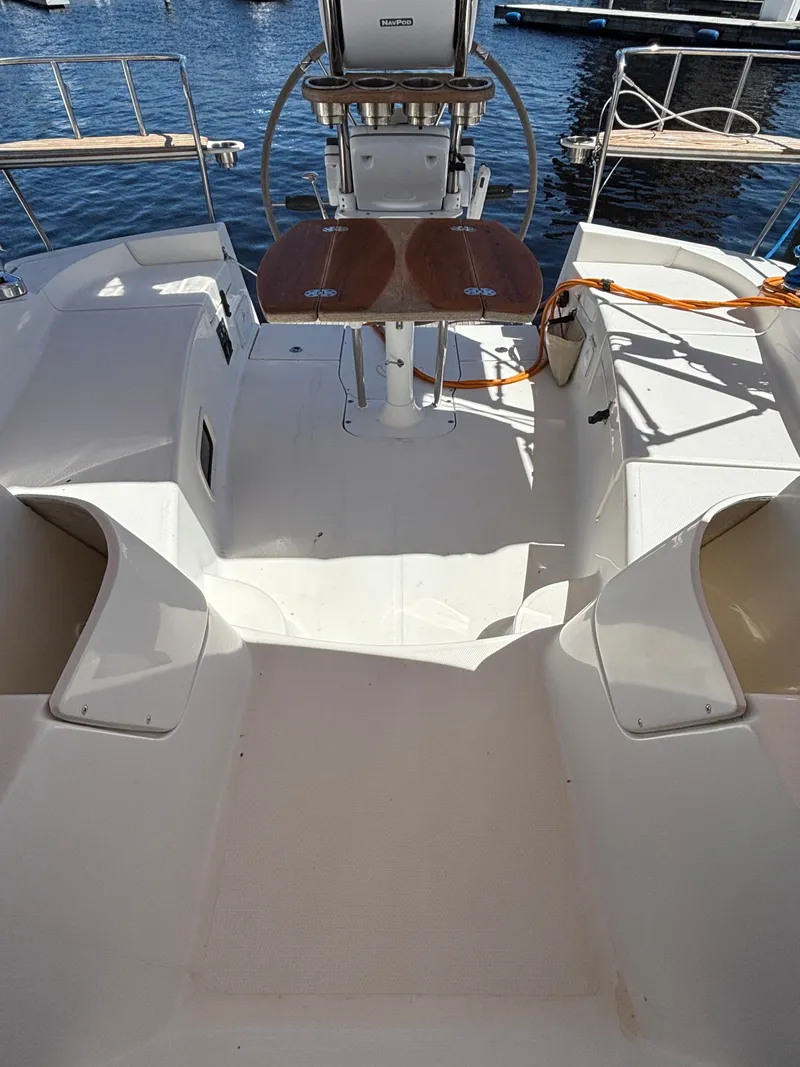 Slide: The Image of Cockpit of a 2016 Marlow-Hunter 37 sailboat by the water. - 35