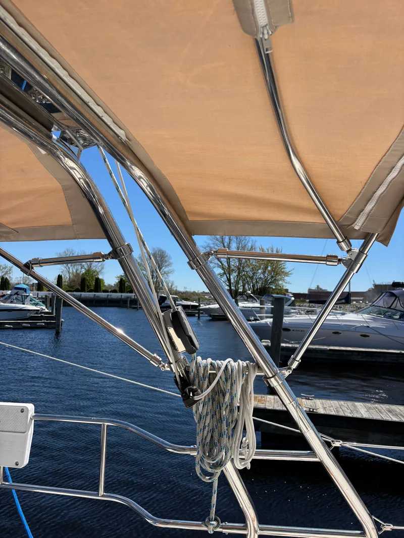 Slide: The Image of Marlow-Hunter 37 sailboat, 2016, with sunshade at marina. - 42