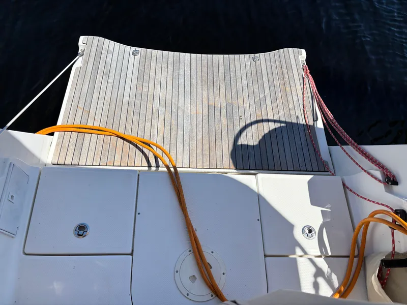 Slide: The Image of Stern platform of a 2016 Marlow-Hunter 37 yacht with ropes. - 48