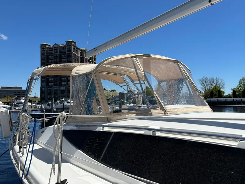 Slide: The Image of 2016 Marlow-Hunter 37 sailboat docked under clear blue sky. - 7