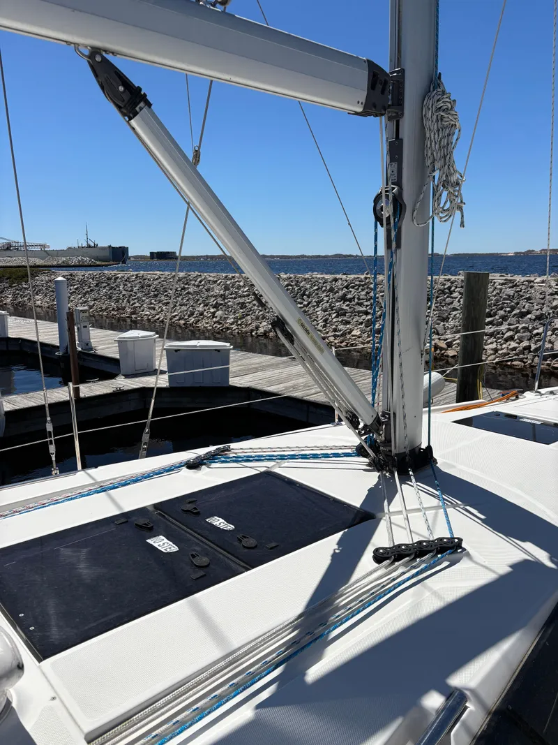 Slide: The Image of 2016 Marlow-Hunter 37 sailboat docked under clear blue sky. - 9