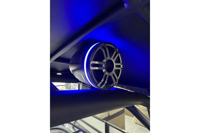Slide: The Image of Illuminated speaker on 2026 Yamaha Boats 255XD, featuring sleek design and blue LED lighting. - 10