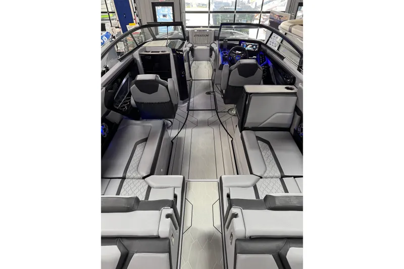 Slide: The Image of 2026 Yamaha Boats 255XD interior with modern seating and sleek design. - 13