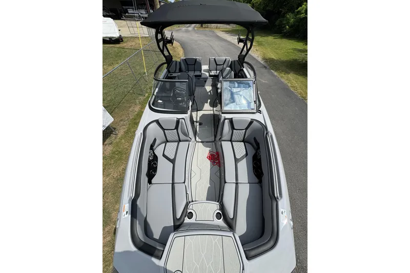 Slide: The Image of 2026 Yamaha Boats 255XD with sleek gray interior and spacious seating. - 4