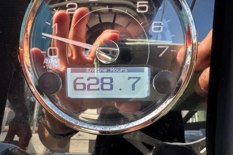 Slide: The Image of Close-up of a 2019 Monterey M-65 engine hour meter displaying 628.7 hours. - 23
