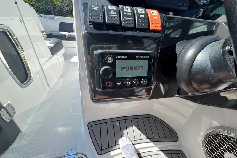 Slide: The Image of Control panel of a 2019 Monterey M-65 boat featuring Fusion audio system. - 27