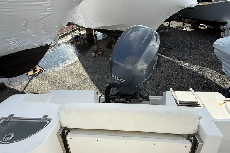 Slide: The Image of 2015 Sportsman Open 212 Center Console with Yamaha 150 outboard engine. - 11