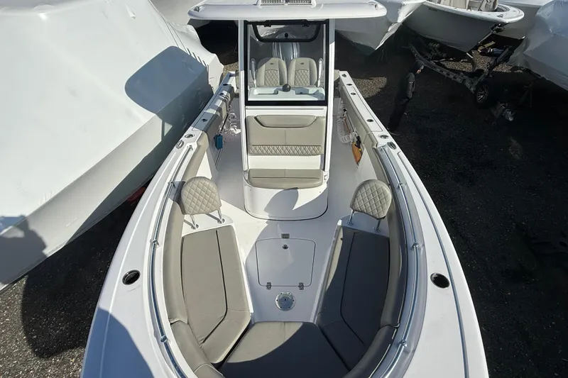 Slide: The Image of 2025 Sportsman Heritage 231 Center Console boat with spacious seating and modern design. - 6