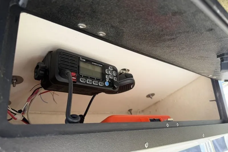 Slide: The Image of VHF radio installed in 2022 Key West 189 FS boat compartment. - 10
