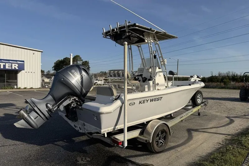 Slide: The Image of 2022 Key West 189 FS boat on trailer with Yamaha outboard motor. - 2