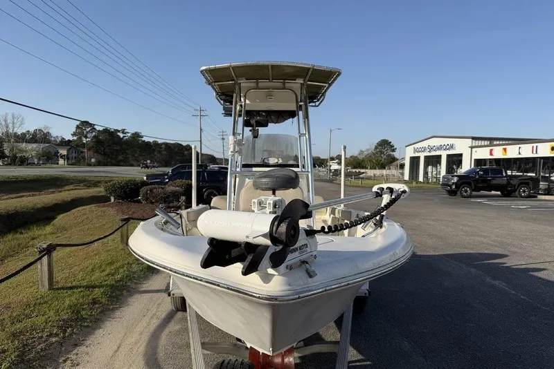 Slide: The Image of 2022 Key West 189 FS boat parked outdoors near a showroom. - 3