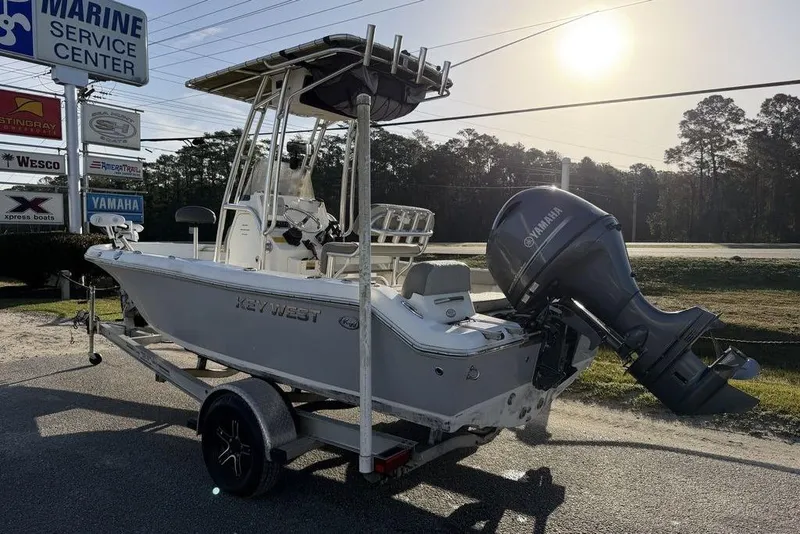 Slide: The Image of 2022 Key West 189 FS boat on trailer at marine service center. - 7