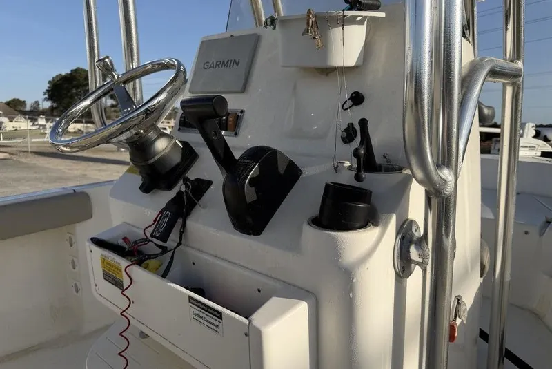 Slide: The Image of Center console of a 2022 Key West 189 FS boat with Garmin equipment. - 9