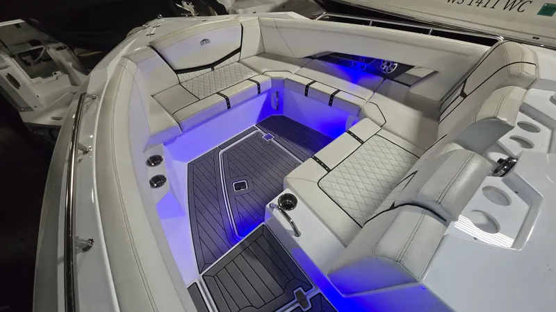 Slide: The Image of Interior of 2017 Cruisers Yachts 338CX with blue LED lighting. - 13