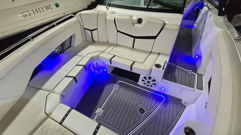 Slide: The Image of Interior of a 2017 Cruisers Yachts 338CX with blue LED lighting. - 14