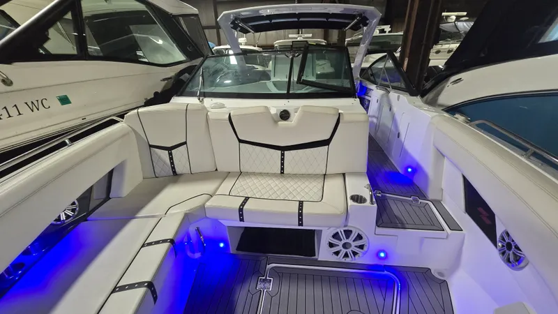 Slide: The Image of Interior of a 2017 Cruisers Yachts 338CX with blue LED lighting. - 15