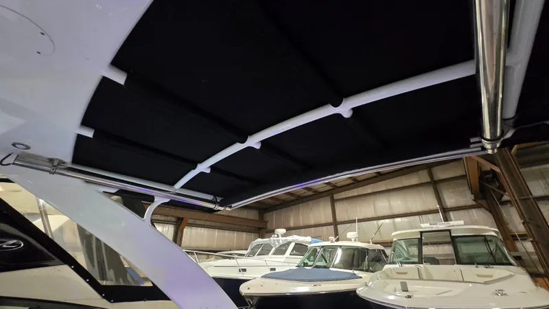 Slide: The Image of Interior view of a 2017 Cruisers Yachts 338CX in a storage facility. - 16