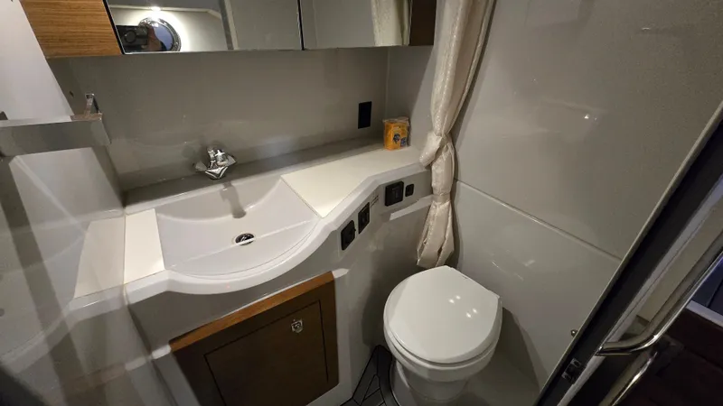 Slide: The Image of Luxurious bathroom in a 2017 Cruisers Yachts 338CX. - 25