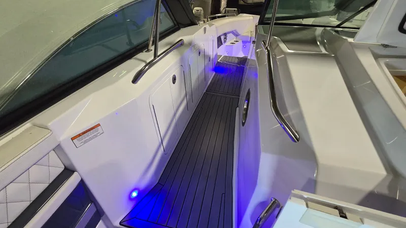 Slide: The Image of Interior of 2017 Cruisers Yachts 338CX with blue lighting. - 9