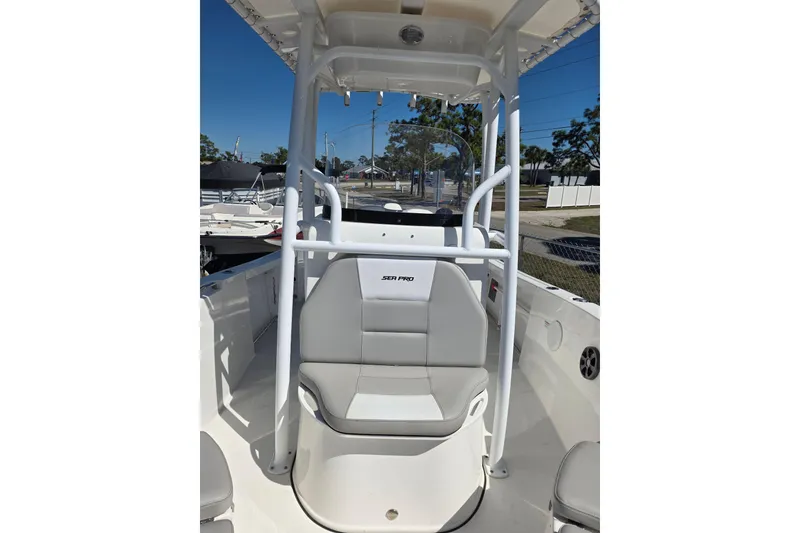 Slide: The Image of 2018 Sea Pro 219 Center Console boat with gray seating. - 16