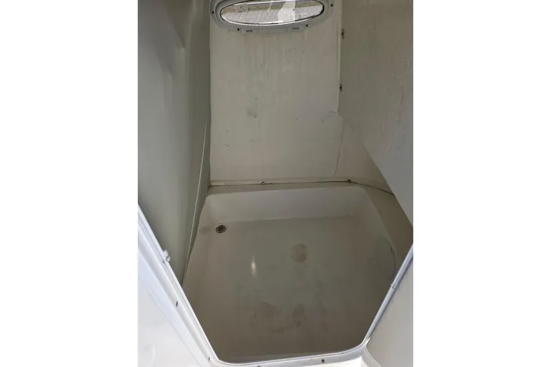 Slide: The Image of Interior view of 2018 Sea Pro 219 Center Console boat compartment. - 18