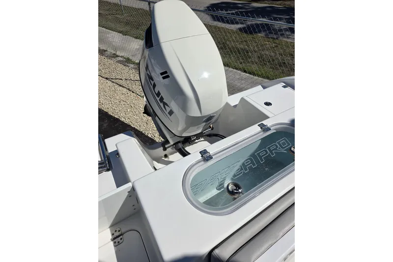 Slide: The Image of 2018 Sea Pro 219 Center Console with Suzuki outboard motor. - 19