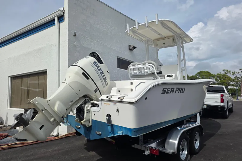 Slide: The Image of 2018 Sea Pro 219 Center Console boat with Suzuki outboard motor on trailer. - 3