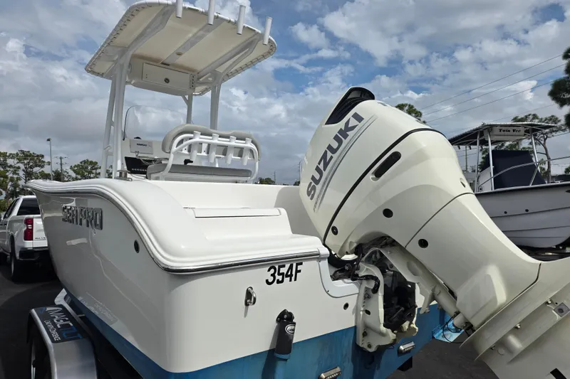Slide: The Image of 2018 Sea Pro 219 Center Console boat with Suzuki outboard motor. - 4