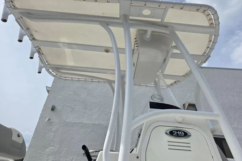 Slide: The Image of 2018 Sea Pro 219 Center Console boat with T-top, viewed from below. - 7