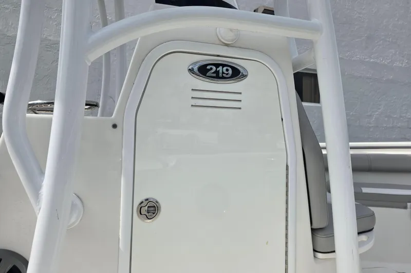 Slide: The Image of 2018 Sea Pro 219 Center Console boat, white exterior, close-up view. - 8