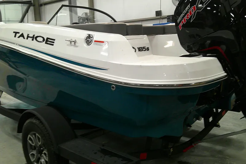 Slide: The Image of 2025 Tahoe 185 S boat with Mercury Pro engine in a showroom. - 3